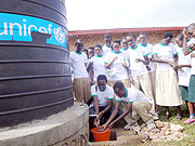 Students using one of the tanks donated by REMA.(Photo: F. Ntawukuriryayo)