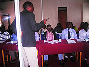 Attentive volunteers listen to the trainer.
