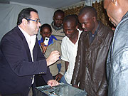 CISCO officials conducting hands on IT  training at Gicumbi telecenter. (Photo/  A.Gahene)