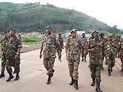 RDF and Burundian troops crossing the border at Gatuna from joint exercises by EAC member states.