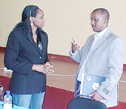 PUT TO TASK: Karongi District Mayor Bernard Kayumba explains a point to Agriculture Minister Agnes Kalibata after the meeting. (Photo: S. Nkurunziza)