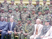 Ambassadors, Richard Kabonero, Frans Makken,Gen James Kabarebe  and Maj,Gen.Karenzi Karake pose for a photo with the officers after the course (Photo B Mkombozi)