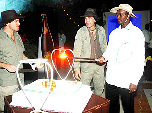 (L-R) The Managing Director of Bralirwa Sven Piederiet, Bralirwau2019s Commercial Director Alexander Koch, and PSFu2019s Chief Executive Officer Emmanuel Hategeka cut the cake to officially launch Turbo King.(photo by F.H Goodman)