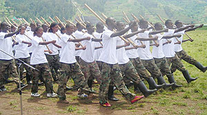 Students march during pass-out after completing ingando. (Photo: B. Mukombozi)