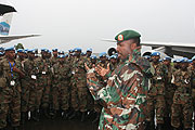 Chief of Staff Land Forces Lt. Gen Charles Kayonga addressing the RDF soldiers upon arrival at Kigali International Airport last evening.