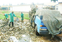Garbage collectors in Kayonza using bare hands . (Photo / S. Rwembeho)