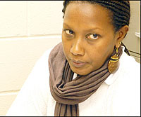 Odette Uwambaye counsels Rwandans who face deportation.(Photo. Dana Wagner)