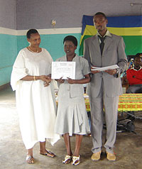 One of the graduands displays her graduation certificate.(Photo/ J. Byiringiro)