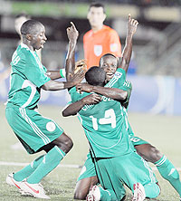Nigerian players celebrate the second goal during the second semi final of FIFA U-17 World Cup against Spain in Lagos