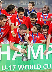 Switzerlandu2019s Soccer players react with their trophy after beating Nigeria during their U17 World Cup Final