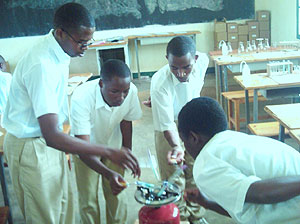 Candidates doing Chemistry practical exams at Groupe scolaire Officiel de Butare. (Photo/ F Ntaweukuriryayo)