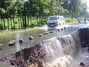 A long stretch of Ruhengeri-Cyanika road has been blocked by floods. (Photo: B. Mukombozi)