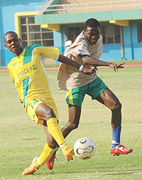 Andre Lomami (L) will be a happy man that his team is at the top of the league table.