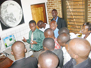 Local leaders from the Province listen to a presentation on GIS during celebrations to mark world GIS day on Monday. (Photo: J.B. Ntirenganya)