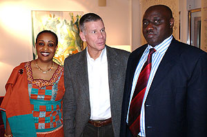 The Director General of SIDA, Anders Nordstru00f6m, centre, speaks with Commissioner General of Police, Emmanuel Gasana while Ambassador Jacqueline Mukangira, looks on.