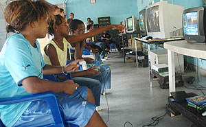 Children playing computer games at Cercle Sportif yesterday ( Photo/ F. Goodman)