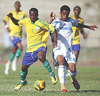 Rwandau2019s Haruna Niyonzima battles for possesion with a Somali opponent yesterday. Amavubi return to action Thursday against Eritrea. (Photo/ Cecafa)