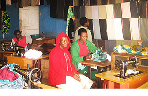 Some of the youth involved in a tailoring class. (Photo: C. Nyiramatama)