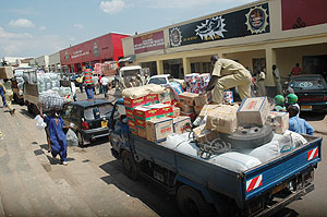 DOWNTOWN DURING DAY: Goods being offloaded in Matheus street, one of the busiest streets during day. Such places are dead at night. (File Photo)