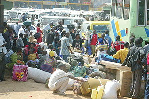 Passengers at Nyabugogo Taxi Park. ATRACO have appealed to City authorities to reduce charges on the park (Photo/ G Mugoya)