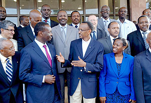 President Paul Kagame with Monique Nsanzabaganwa, Minister of Trade and Industry and Robert Bayigamba, president of the Private Sector Federation and some of the participants at the 3rd Presidential Business Round Table. (Photo Urugwiro Village)