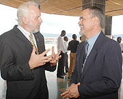 Steinar Sundvoll, the first Norwegian honorary consul to Rwanda chatting with CARE International country director Philip Christensen at Ebenezer House on Friday (Photo F Goodman)