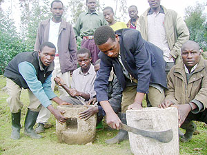 Residents demonstrate their stoves made out of Volcanic Larva. (Photo: B. Mukombozi)