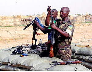Doing their duty. Rwandan AU Peacekeepers in Darfur, Sudan.