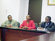 L-R: Prof Silas Lwakabamba, Huye Vice Mayor Marie Claire Mukamusonera and Dr Uzziel Ndagijimana during the cheque hand over ceremony. (Photo: P. Ntambara)