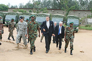 RDF Chief of staff Lt. Gen. Charles Kayonga and US Ambassador Stuart Symmington and other officials inspecting the Gako military facility that  was donated by the US. (Courtsey Photo)