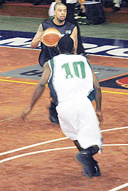 APRu2019s Mathew Miller taking a shot against Kano Pillars of Nigeria. His failure to shoot three pointers yesterday cost the team top spot. (File photo)