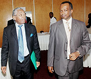 Infrastructure Minister Vincent Karega with the Kenyan Minister for Transport Chirau Ali Mwakwere yesterday. (Photo/ J. Mbanda)