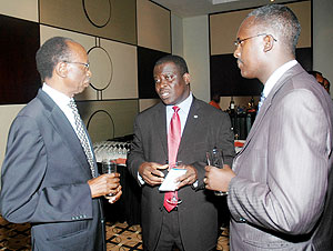 Ecobank Managing Director Daniel Sackey (C) with the Bank Board Chairman Emmanuel Ndahimana (L) and the head of Brand and Communication Patrick Masumbuko at the function. (Photo J Mbanda)