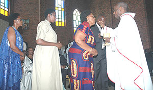 Christians receiving holy communion in Remera Church. The business community would appreciate such numbers at their premises