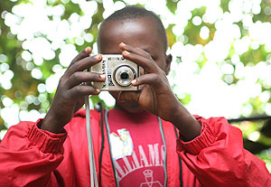 One of the children taking a photo