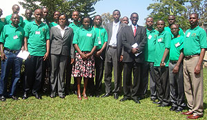 EAC Minister Monique Mukaruliza in a group photo with EACSU committee members. (Photo. I. Niyonshuti)