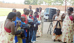 Students recieving  gifts from FXB International (Photo: D. Sabiiti)