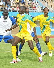 Atracou2019s Johnson Bagoole battles with Rayon Sportu2019s Jimmy Kidega in a league encounter last season. The League has been running without a sponsor but Braliwa is keen to come 