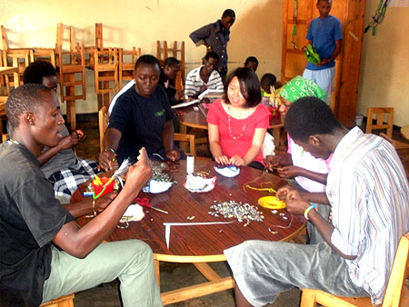 Busy making paper necklaces and bracelets. (Photos by Gloria I.A)