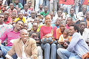 GIVING BACK:  Alpha Rwirangira, Cynthia Akazuba with street children after giving them the Christmas gifts (Photo/F. Ndoli )