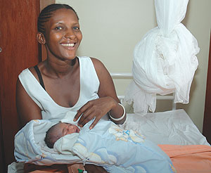 CHRISTMAS GIFT: Marie France Uwishuri with her bundle of joy at Muhima Hospital. (Photo/F. Goodman)