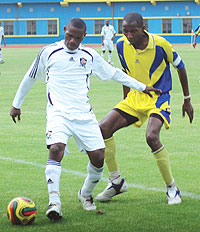 Labama Bokota shields the ball against a Musanze player earlier in the season at Amahoro stadium. The striker netted two and set up two as APR thrashed AS Kigali 4-1 yesterday. (File photo)