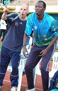 DO U SEE WHAT I AM SEEING: Micheal Nees indicates something to his assistant  Nshimiyimana during CAN Ghana 2008 qualifier against Eq. Guinea. Rwanda won 2-0.