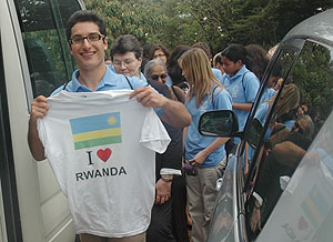 LOVE AT FIRST SIGHT: A participant in the Human Rights conference displays his souvenir T-shirt. (Photo/ J. Mbanda)