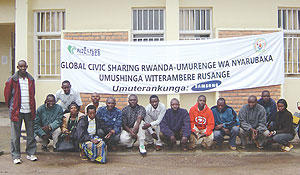 BENEFITED: Some of the projectsu2019 beneficiaries in a group photo.(Photo/M. Gahigi)