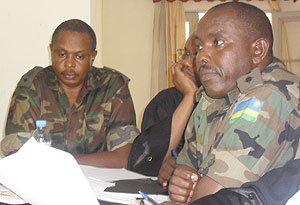THE ACCUSED; Lt. Col Paul Semana (L) and his co-accused Captain Denis Rwamo (R) during the hearing. (Photo: E. Mutara)