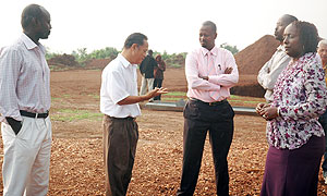 Gashlan Ahmad, the Project Manager  explaining to the Rwanda Free Trade company chairman Jack Kayonga. (Photo/ F.Goodman)