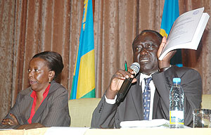 Justice Minister Tharcise Karugarama launches the Mutsinzi Report on Monday. (Photo J Mbanda)