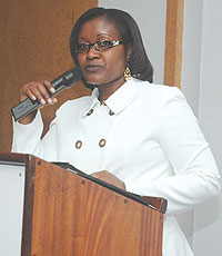 Monique Mukaruliza addressing the guests at Mille Collines on Friday evening