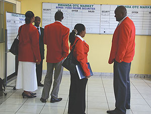 Stock brokers on the trading flow at the Rwanda Over-The-Counter (OTC) market .